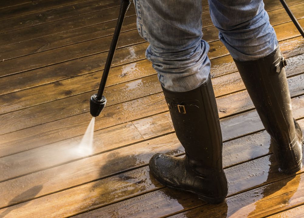 Deck cleaning with a pressure washer in Gresham, OR